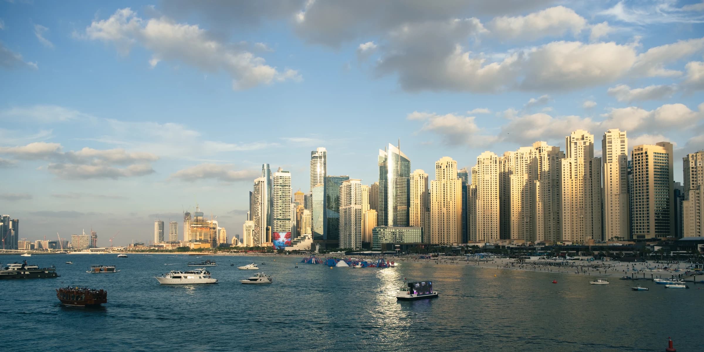 Jumeirah Beach Residence and the Dubai Marina skyline seen across the waterfront