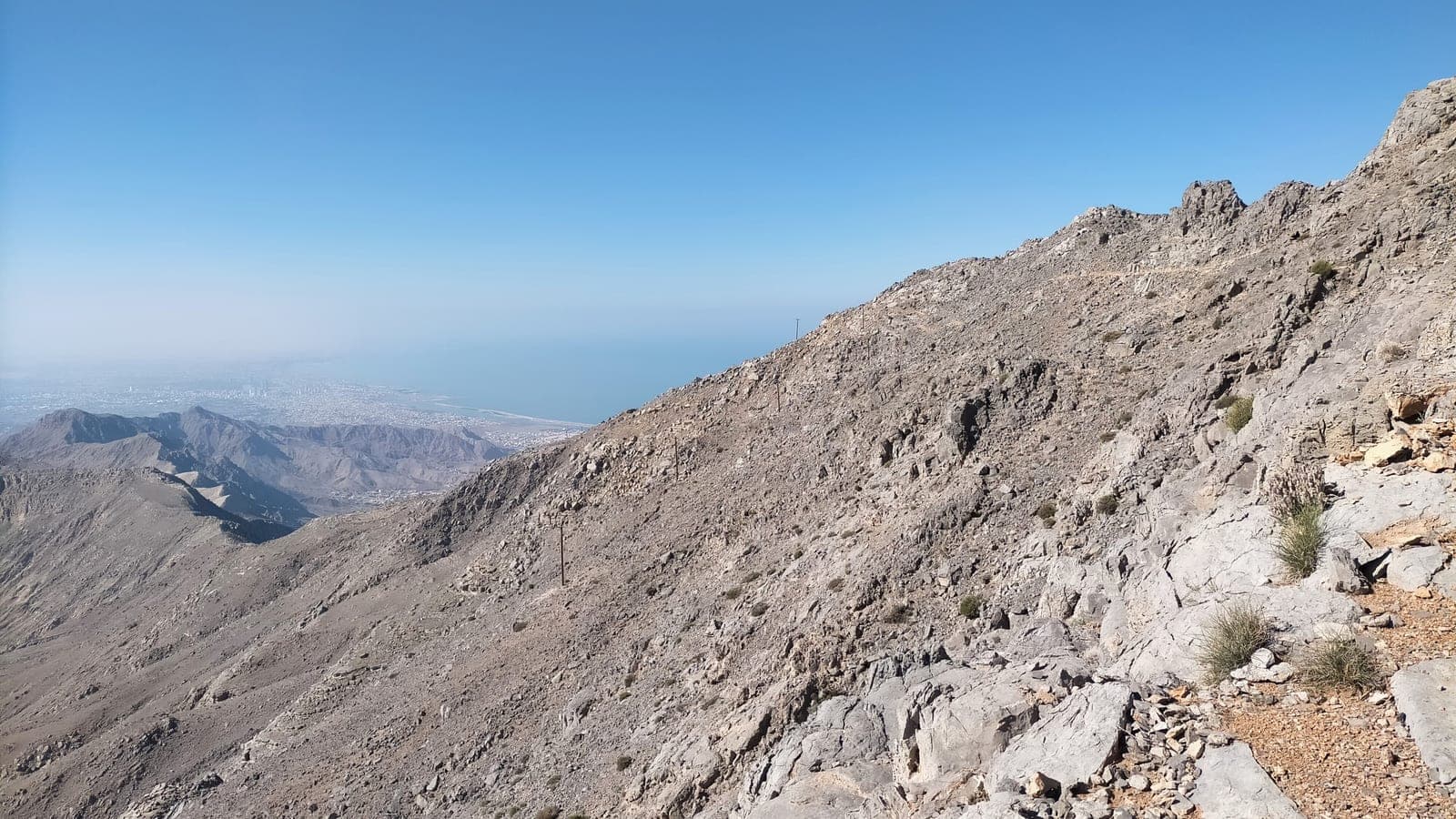Rocky ridge of the Hajar mountains above the Ras Al Khaimah coastline