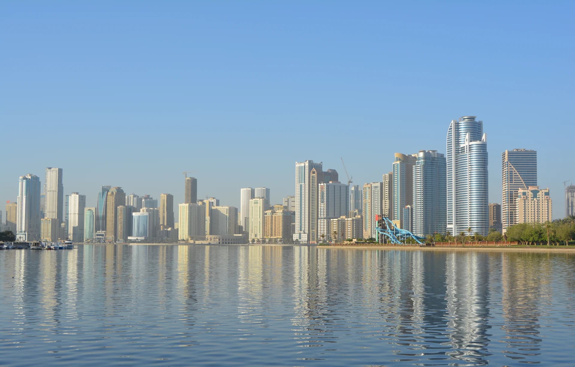 Sharjah residential towers reflected in the waterfront in 2015